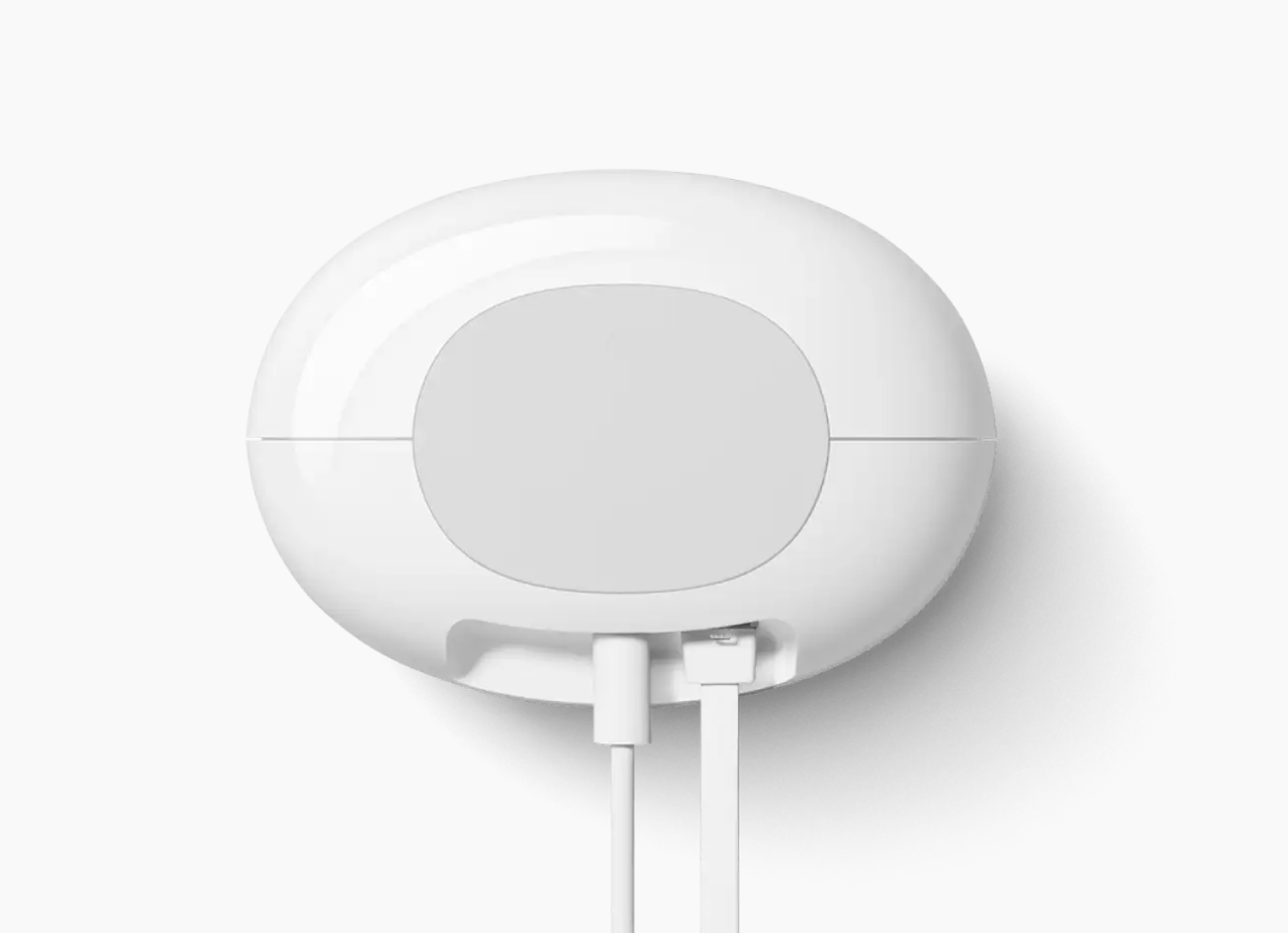 Nest Wifi Pro top-down view showing the oval footprint and cable routing