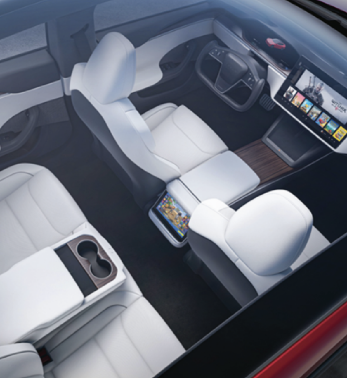 Tesla Model S Plaid interior with white seats and central touchscreen